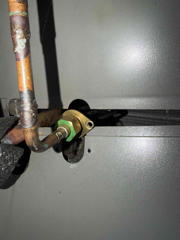 Completed courtesy check on two air conditioning systems using 20x25x1 filters. Inspected electrical components and refrigerant lines on both units. Found capacitor showing signs of corrosion and oxidation on terminal connections, requiring monitoring for future replacement. Copper refrigerant lines displayed significant corrosion and surface deterioration, though system remained operational. Documented equipment condition with photos for maintenance records.
