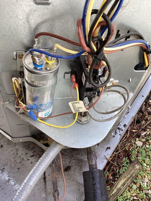 Completed courtesy check on two air conditioning systems per maintenance agreement. Inspected air filtration system with pleated media filter in clean condition, verified proper installation in black metal housing. Examined outdoor condensing unit electrical components including capacitor with proper wire connections, contactor relay, and associated wiring. All components found to be functional and properly installed. Customer declined media filter replacement at this time.