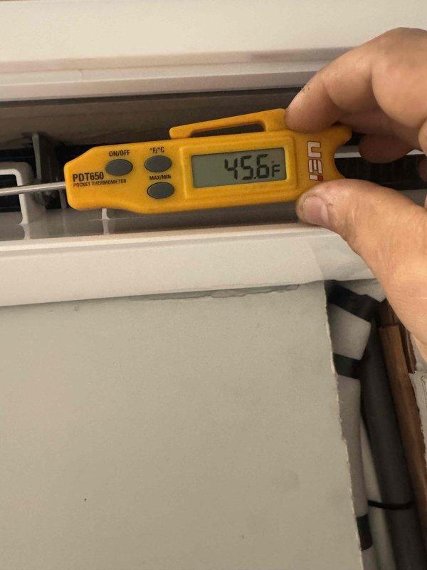 Responded to callback for recently installed Mitsubishi split system with indoor unit experiencing severe frosting, water overflow, and no cooling despite three previous service visits. Upon arrival, confirmed supply air temperatures reading 45.6°F-46.7°F at discharge vents, indicating refrigerant flow but inadequate cooling performance. Documented equipment conditions with thermal measurements to support warranty claim and escalation to manufacturer technical support for resolution of recurring freeze-up issue.