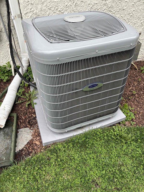 Completed routine HVAC maintenance agreement service on Carrier split system. Performed comprehensive cleaning and inspection of outdoor condenser unit and indoor air handler. Replaced 20x25x1 air filter at air handler location. Inspected condenser coil fins, verified proper airflow, and checked electrical connections at outdoor unit. Examined control board wiring and electrical components inside air handler cabinet, confirming all connections secure and system operating within normal parameters. Discussed previously recommended thermostat upgrade options with customer who expressed continued interest in replacement.