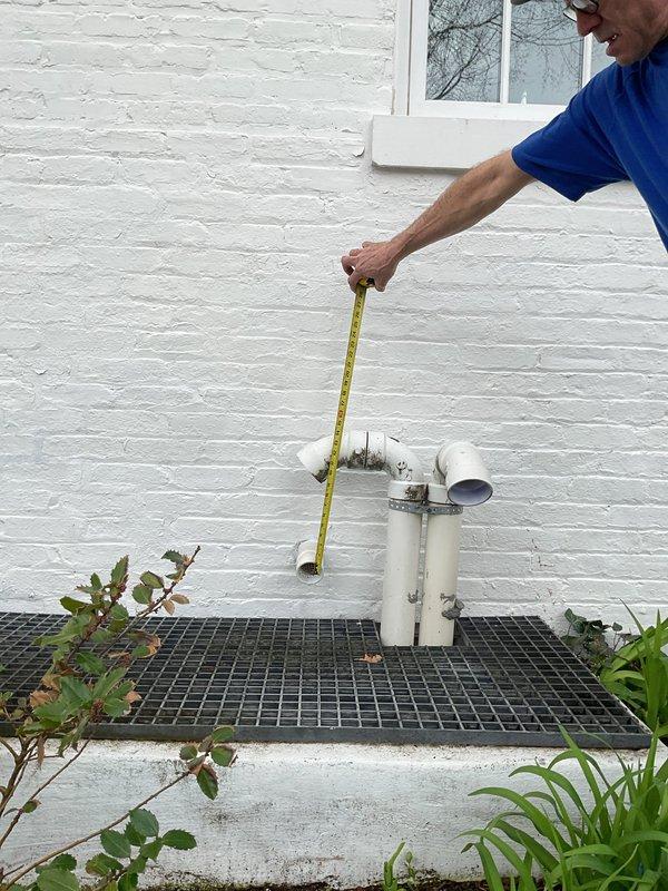 Installed new 50-gallon tanked water heater with expansion tank at residential property. Properly configured exterior PVC venting system along foundation, securing all pipes to building exterior with appropriate mounting hardware and ensuring proper clearances per manufacturer specifications and local code requirements.