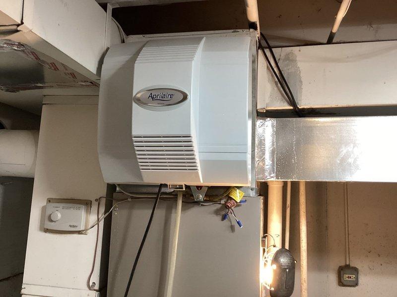 Completed comprehensive second opinion inspection and maintenance evaluation of Heil forced-air furnace system. Performed thorough assessment of furnace unit, including examination of main access panel, burner assembly, and heat exchanger components. Inspected Aprilaire whole-home humidifier installation and verified proper operation, water supply connections, and electrical wiring. Evaluated HVAC ductwork connections and confirmed proper integration with humidification system. All system components found to be properly installed and functioning within manufacturer specifications.