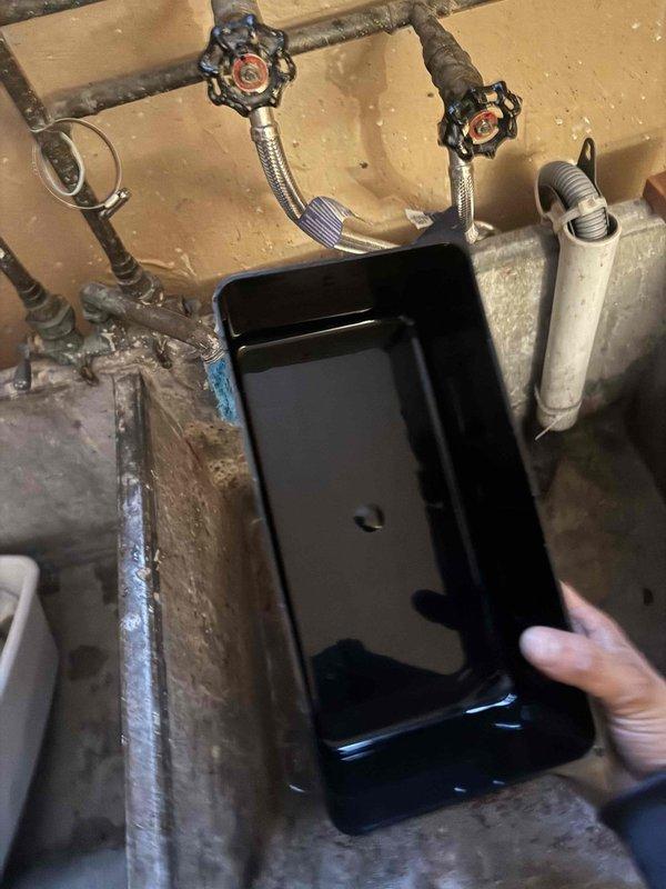 Completed comprehensive air conditioning maintenance and system inspection as part of customer agreement. Verified electrical readings using digital multimeter, confirming proper voltage and amperage levels at outdoor unit. Inspected condensate drain system and positioned drain pan beneath water heater connections to protect against potential leaks.