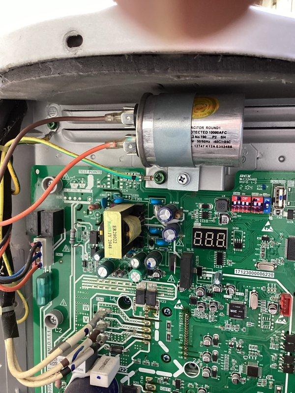 Returned to property to complete capacitor replacement on HVAC unit. Removed access panel to expose control board and capacitor assembly. Disconnected and removed failed capacitor from system. Installed new replacement capacitor with proper electrical connections and terminal configuration. Verified all wire connections were secure and properly seated. Tested system operation to confirm capacitor function and unit performance. Reinstalled access panel and restored unit to normal operation.