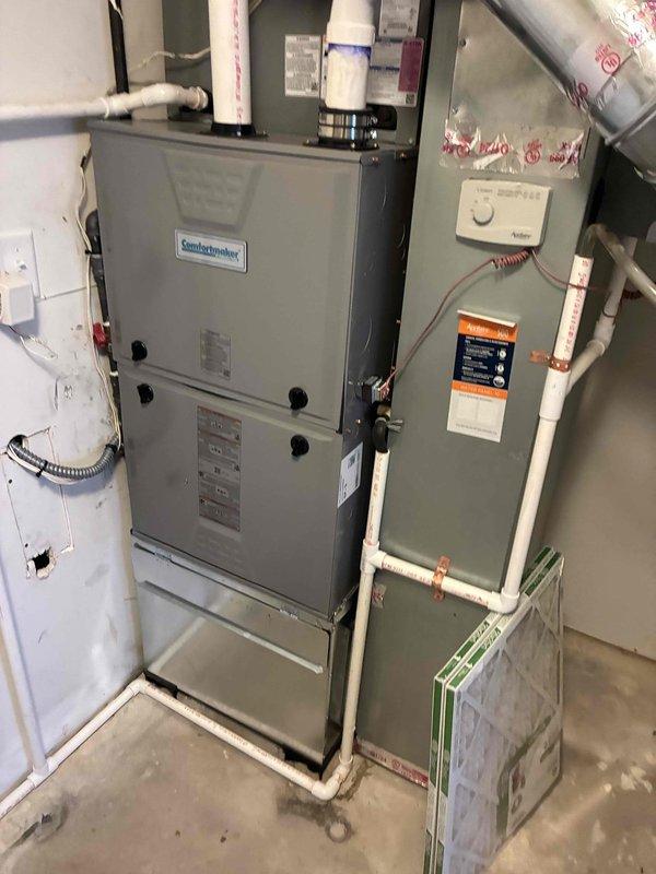 Responded to no cooling complaint on Comfortmaker HVAC system running continuously without reaching setpoint. Upon arrival, performed system diagnostics and visual inspection of air handler unit and associated components. Identified issue with system operation preventing adequate cooling capacity. Inspected thermostat communication, refrigerant lines, electrical connections, and ductwork configuration. Verified proper airflow through system and checked filter condition. Addressed the underlying cause preventing the unit from achieving desired temperature. System tested and confirmed operational with proper cycling and temperature differential. Unit now maintaining setpoint as designed.