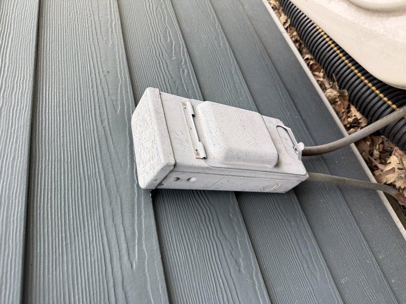 Responded to no cooling complaint on 6-year-old AC unit located in backyard. Upon arrival, inspected outdoor condensing unit and verified power supply at deck-mounted electrical outlet box. Accessed attic space and examined supply ductwork and air distribution system, noting 25x4 filter dimensions and confirming proper insulation on main supply trunks. System evaluated for electrical connectivity, airflow restrictions, and mechanical operation to diagnose cooling failure.