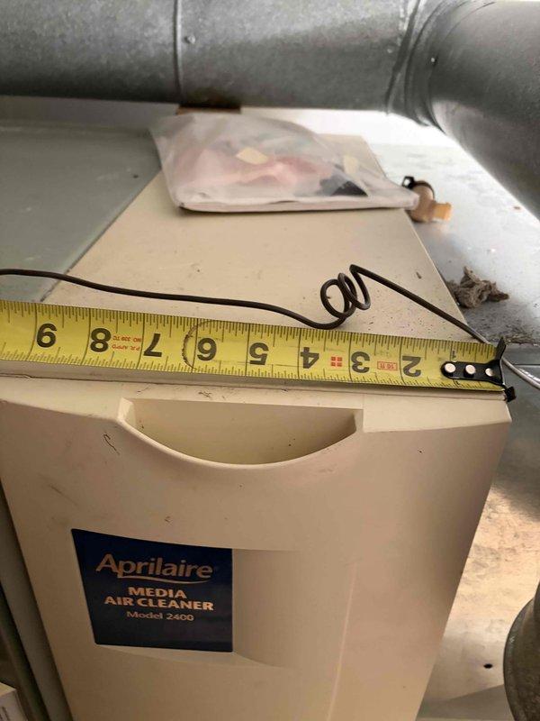 Completed comprehensive assessment of two complete HVAC systems, both 22 years old and operating with obsolete R22 refrigerant. Documented existing Trane furnace unit with integrated ventilation system and Aprilaire Media Air Cleaner Model 2400. Both air conditioning systems have reached end of serviceable life due to phased-out refrigerant and age-related obsolescence. Recommended complete replacement of both full systems to restore reliable climate control and improve energy efficiency.