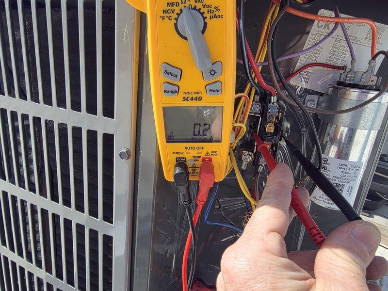 Responded to callback for furnace installed Friday not heating. Upon arrival, performed diagnostic testing on rooftop HVAC installation. Used digital multimeter to test electrical components and verified proper voltage readings at capacitor and associated connections. Inspected wiring harness and confirmed all electrical connections were secure and properly terminated. System tested and verified operational.