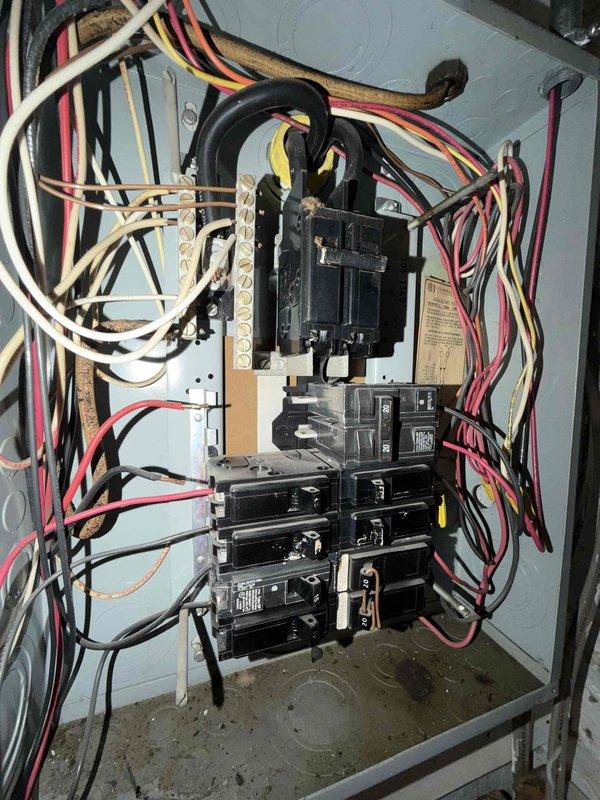 Returned to site to replace faulty circuit breaker, power switch, and corresponding transformer in electrical panel. Upon inspection, discovered water pooling in bottom of panel box, indicating moisture intrusion that likely contributed to component failure. Successfully installed new breaker and associated electrical components, restoring proper power supply to HVAC system.