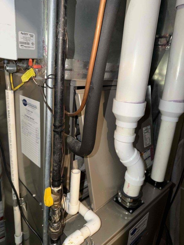 Completed preventive maintenance agreement service on residential HVAC system. Replaced two air conditioning system filters with new 20x25x1 and 16x25x1 filters as specified. Inspected electrical components including dual-run capacitor rated at 45/5µF 440VAC and contactor assembly, confirming proper connections and secure wire terminations. Verified all mechanical and plumbing components in utility room, documented system condition with photographic evidence showing proper installation and component labeling.