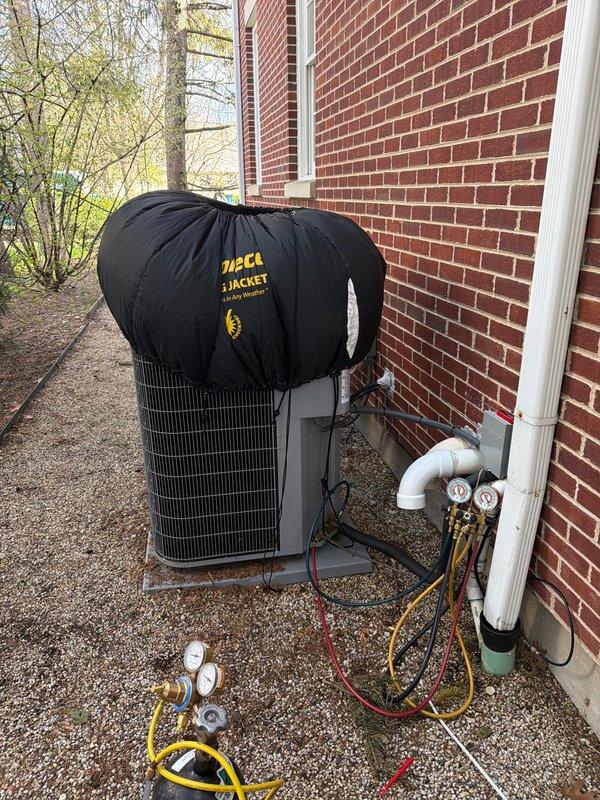 Performed comprehensive preventive maintenance on two air conditioning systems under agreement terms. Changed 20x25x4 filters on both units and serviced electronic air cleaner. Connected manifold gauges to outdoor condensing unit to verify refrigerant pressures and system performance, ensuring optimal operation for continued cooling efficiency.