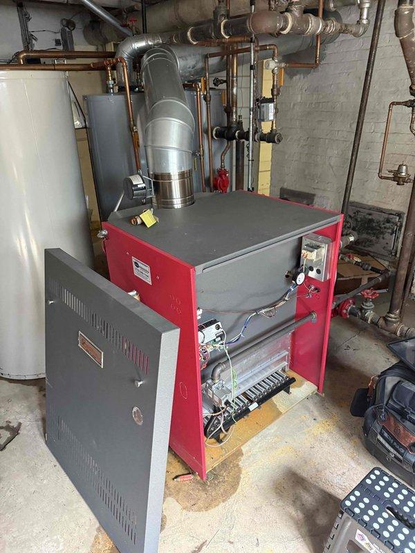 Responded to no heat call for residential boiler system. Upon arrival, confirmed boiler and domestic water heater were inoperative due to extinguished pilot lights. Successfully relit pilots on both units, verified proper ignition and flame characteristics, and confirmed system returned to normal operation. Tested thermostat communication and observed boiler cycling properly through heating demand. Verified water heater pilot stability and burner operation. System restored to full functionality with both heating and domestic hot water operating as designed.