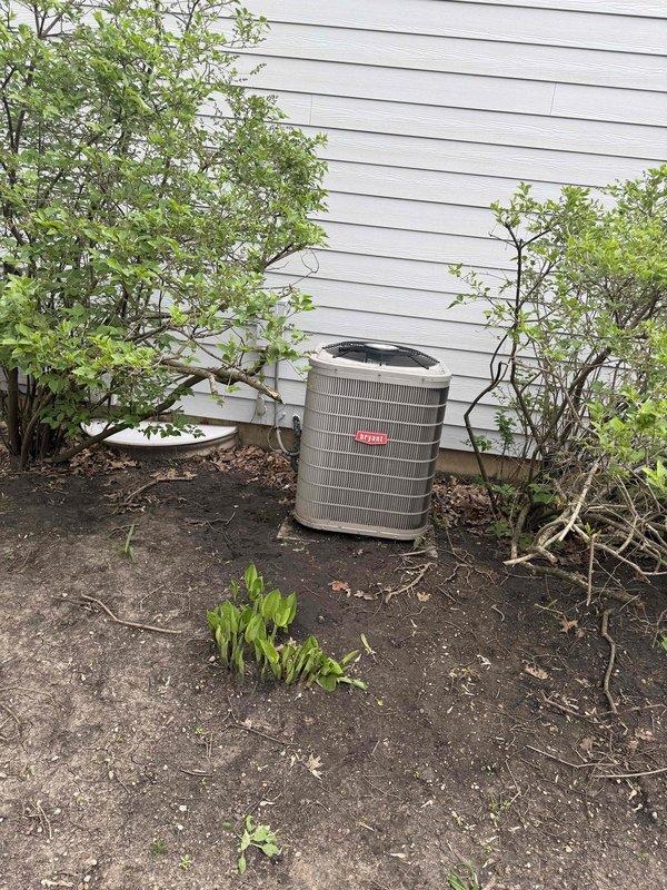 Completed HVAC system replacement for a 19-year-old outdoor condenser unit experiencing active refrigerant leak and failing electrical components. The existing unit, located in an easily accessible side yard area with adequate clearance, was removed and replaced with a new system. All ductwork connections in the attic space were inspected and verified to be compatible with the new equipment installation.