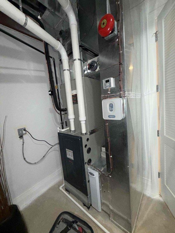 Performed preventative maintenance agreement service on residential HVAC system including two condenser units. Completed comprehensive system inspection of air handler, ductwork, refrigerant lines, and associated components located in mechanical room and attic space. All equipment found operating within normal parameters, no media replacement required during this scheduled maintenance visit.