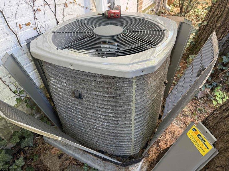 Completed routine maintenance on residential air conditioning system and air handler under Gold Service agreement. Inspected outdoor condenser unit and indoor air handler coil assembly; noted system operational but customer has outstanding payment issues requiring updated credit card information for agreement continuation. Media filter not included in this service visit per agreement terms.