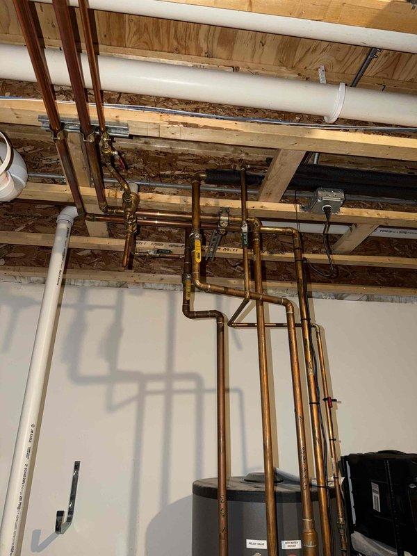 Completed annual maintenance and tune-up service on two residential air conditioning units and one NTI wall-mounted high-efficiency condensing tankless boiler. Performed comprehensive inspection of boiler internal components including stainless steel heat exchanger with vertical ribbing, verified control panel LCD display functionality reading 168 degrees, and examined gas valve, copper piping connections, and electrical wiring systems. Conducted standard preventive maintenance procedures on both AC units to ensure optimal seasonal performance and system efficiency.