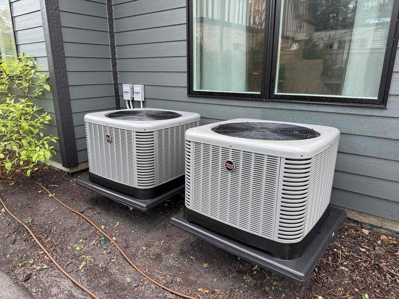 Completed comprehensive HVAC maintenance agreement service on dual-zone system including two outdoor condensing units and indoor air handler with furnace. Performed routine maintenance procedures on both exterior condensers, replaced two media filters (16x25x4 and 20x25x4) per agreement specifications, and verified proper operation of all system components.
