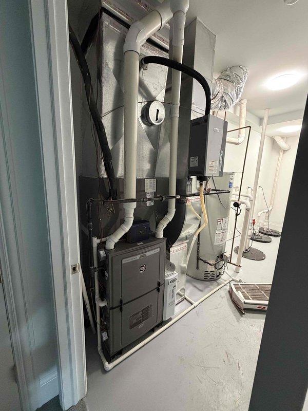 Completed comprehensive HVAC maintenance agreement service on dual-zone system including two outdoor condensing units and indoor air handler with furnace. Performed routine maintenance procedures on both exterior condensers, replaced two media filters (16x25x4 and 20x25x4) per agreement specifications, and verified proper operation of all system components.