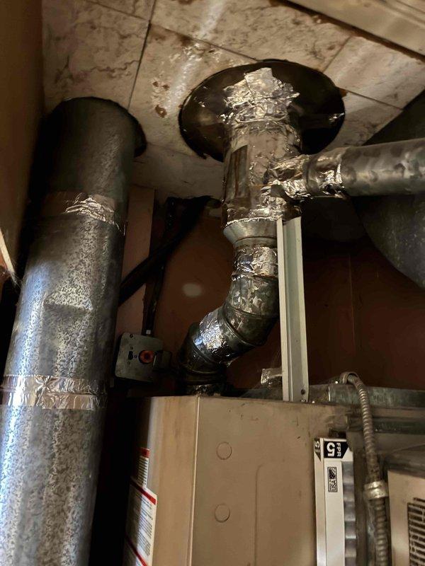 Responded to no heat call on furnace system over 10 years old. Upon arrival, conducted diagnostic inspection of unit located in basement utility area. Verified furnace was not initiating heating cycle and performed systematic troubleshooting of electrical components, controls, and safety devices. Documented existing equipment conditions including ductwork configuration and HVAC unit installation. Coordinated with authorized contact for repair approval prior to proceeding with necessary corrective actions. System evaluated and diagnostic findings communicated to responsible parties for payment arrangements and repair authorization.
