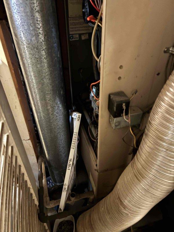 Responded to no heat call on furnace system over 10 years old. Upon arrival, conducted diagnostic inspection of unit located in basement utility area. Verified furnace was not initiating heating cycle and performed systematic troubleshooting of electrical components, controls, and safety devices. Documented existing equipment conditions including ductwork configuration and HVAC unit installation. Coordinated with authorized contact for repair approval prior to proceeding with necessary corrective actions. System evaluated and diagnostic findings communicated to responsible parties for payment arrangements and repair authorization.
