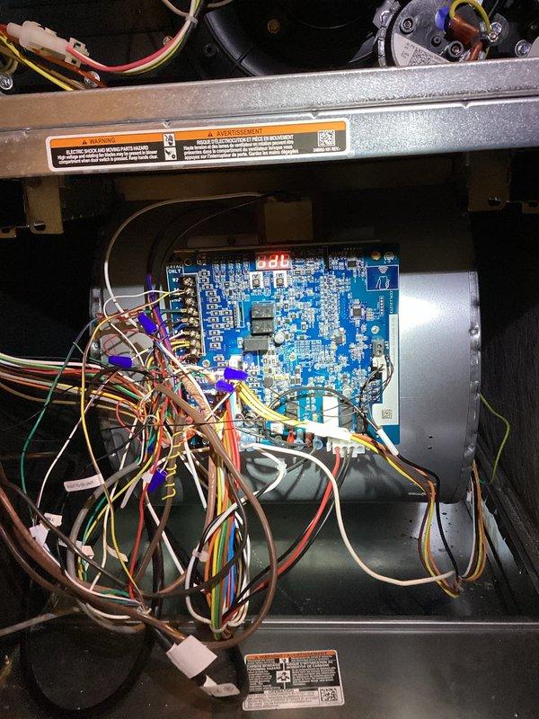 Responded to callback for recurring freeze-up on recently installed HVAC system with multiple unresolved prior visits over past month. Upon arrival, documented frozen evaporator coil with ice accumulation on outdoor condenser unit. Inspected control board, wiring connections, and blower assembly for installation defects or component failures that could cause repeated freeze conditions. Photographed control board configuration and outdoor unit placement for quality review. Customer requested management escalation due to ongoing system performance issues since installation approximately two months ago.