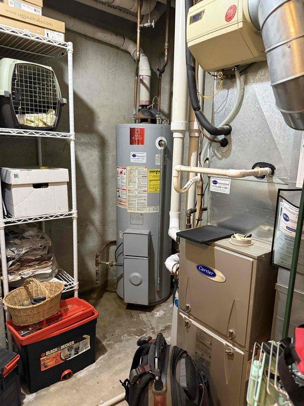 Responded to residential apartment for tanked water heater with pilot light failure. Upon arrival, inspected 15-year-old gas water heater located in basement utility room. Pilot light would not ignite or remain lit after multiple restart attempts. Performed diagnostic testing of thermocouple, gas control valve, and pilot assembly. Observed evidence of water damage on concrete floor surrounding unit, indicating previous or ongoing leakage. Given the age of the equipment and failed ignition system components, recommended full water heater replacement due to end of serviceable life expectancy and potential safety concerns with continued operation. Unit had reached typical lifespan for residential tanked water heaters and showed signs of deterioration. Provided property owner with replacement options and specifications for new installation.