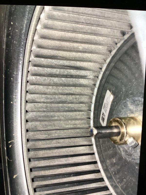 Completed comprehensive air conditioning tune-up and maintenance service. Performed thorough inspection of HVAC system including furnace, ductwork, and Aprilaire humidifier in basement mechanical room. Cleaned blower wheel which had accumulated significant dust and debris buildup, restoring proper airflow and system efficiency.