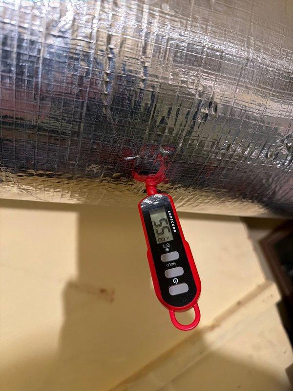 Completed preventive maintenance agreement service on single air conditioning system. Connected manifold gauges to measure refrigerant pressures and recorded supply air temperature of 53°F at register, confirming proper system operation and cooling performance within manufacturer specifications.