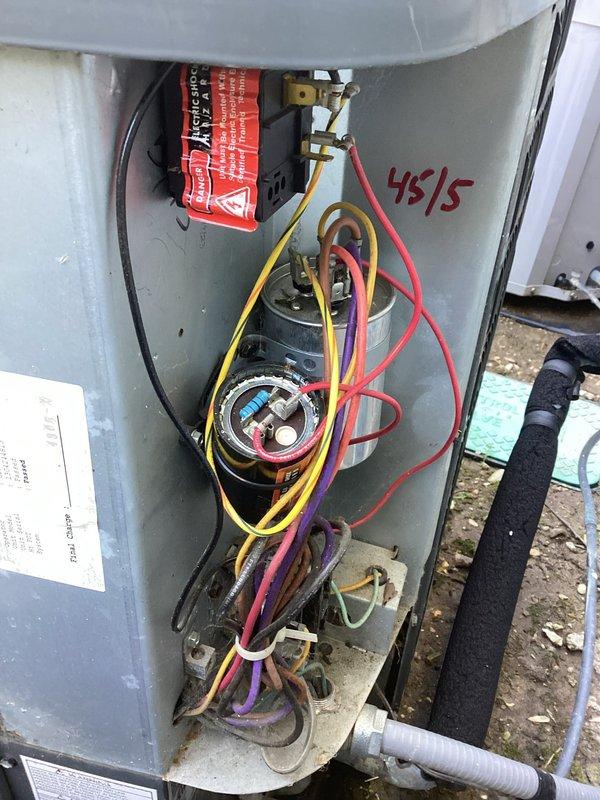 Completed general service maintenance on two air conditioning systems. Inspected electrical components, capacitors, and wiring connections on outdoor condensing unit, verified proper operation and documented equipment conditions. Performed system evaluation on indoor air handler unit, checked airflow direction markings on PVC drainage lines, and confirmed all mechanical components functioning within normal parameters.