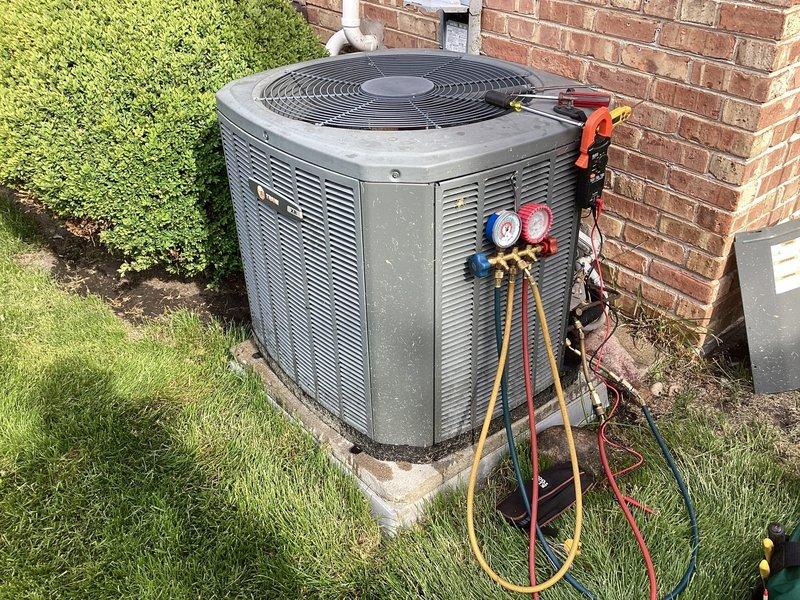 Completed annual maintenance service on residential air conditioning system under preventative maintenance agreement. Performed comprehensive condenser inspection and testing, including refrigerant pressure analysis using manifold gauge set. Verified proper system operation, checked electrical connections, and documented equipment readings showing 16.25 measurement on system component. Unit operating within normal parameters with no deficiencies noted at time of service.