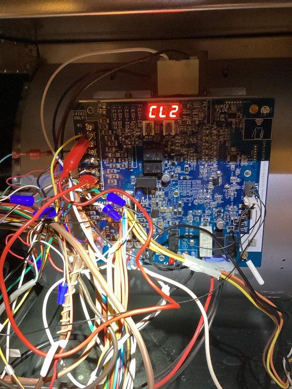 Performed follow-up inspection and verification on recently installed AC unit that experienced multiple service issues during initial two-month operation period. Conducted comprehensive system diagnostics using onboard control board display showing operational status code 272. Inspected electronic control board assembly including upper and lower PCB sections, verified proper LED display function, and examined all wire connections for secure termination. Cleared condensate drain line of accumulated debris and ice buildup to restore proper drainage flow. Confirmed all system components operating within manufacturer specifications and unit cycling properly without fault codes.