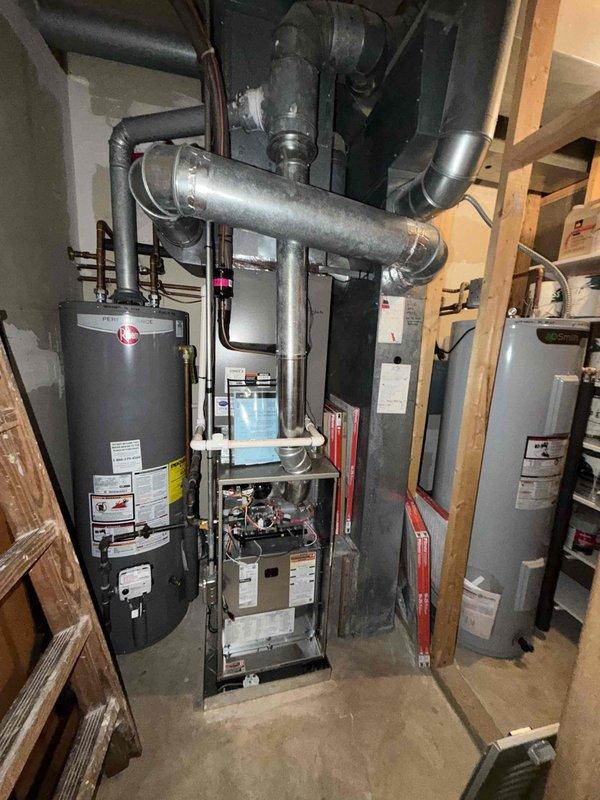 Completed preventative maintenance agreement service on residential HVAC system with two condensers. Inspected furnace, air handler, ductwork, and associated mechanical equipment in utility room, verified all components operating within normal parameters. Replaced heavily soiled air filter with new unit to maintain proper airflow and system efficiency.
