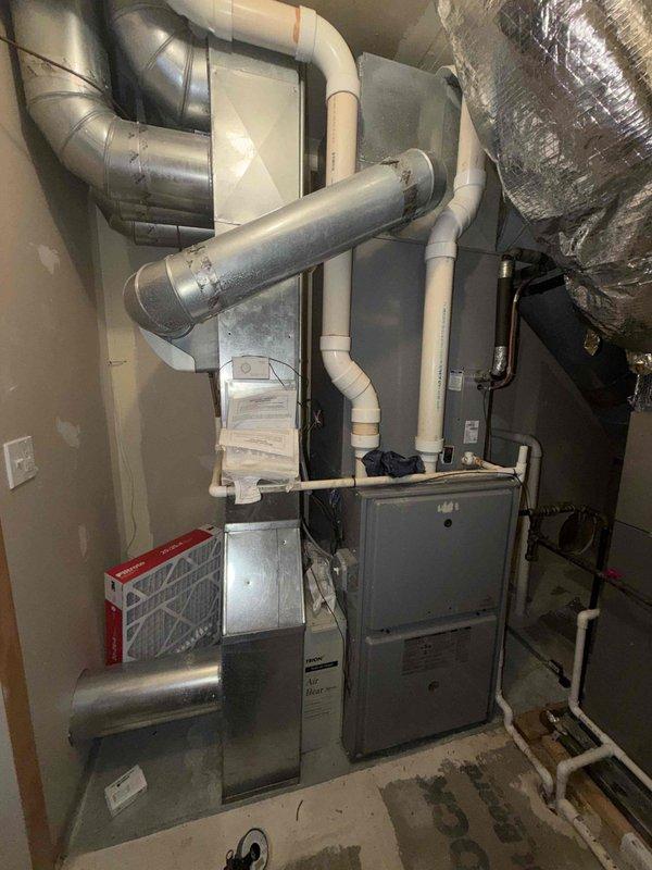 Completed maintenance agreement service on residential HVAC system including two condenser units and furnace inspection. Verified system temperatures reading 72.6°F, replaced 16x25x1 air filter, and inspected all ductwork connections and PVC condensate lines for proper operation. All equipment functioning within normal parameters upon completion.