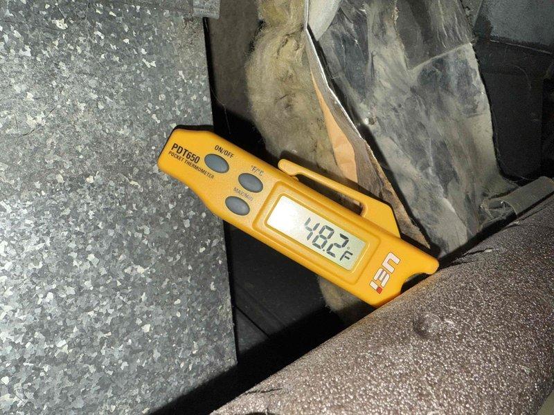 Completed cooling check on single air conditioning system per maintenance agreement. Verified thermostat operation showing 73°F indoor temperature with 35% humidity and confirmed proper temperature differential with supply air reading 48.2°F at the unit. System operating within normal parameters with no deficiencies noted.