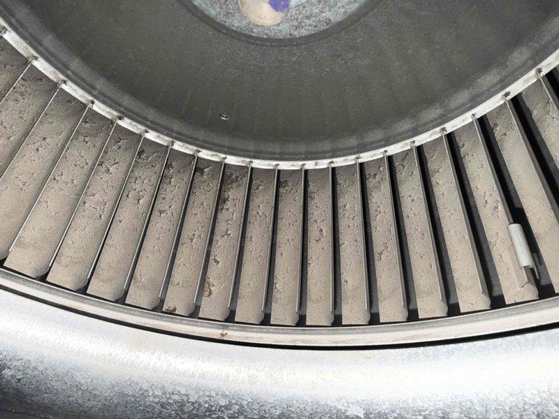 Completed comprehensive cooling maintenance on residential air conditioning system under service agreement plan. Performed thorough inspection of furnace and air handler assembly in basement mechanical room, including blower wheel cleaning to remove accumulated dust and debris from fan cage and interior components. System operational and ready for continued service.