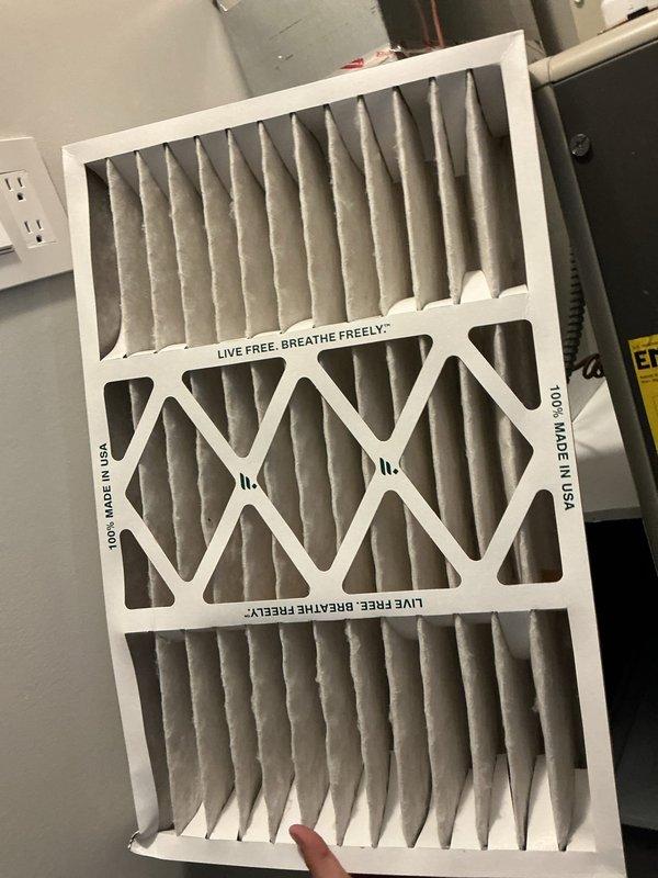 Performed preventative maintenance agreement inspection on four condenser units. Verified thermostat operation with ecobee smart thermostat displaying proper temperature control at 69°F setpoint and humidity reading of 48%. Inspected and documented air filtration system with pleated media filter in place showing adequate condition for continued operation.