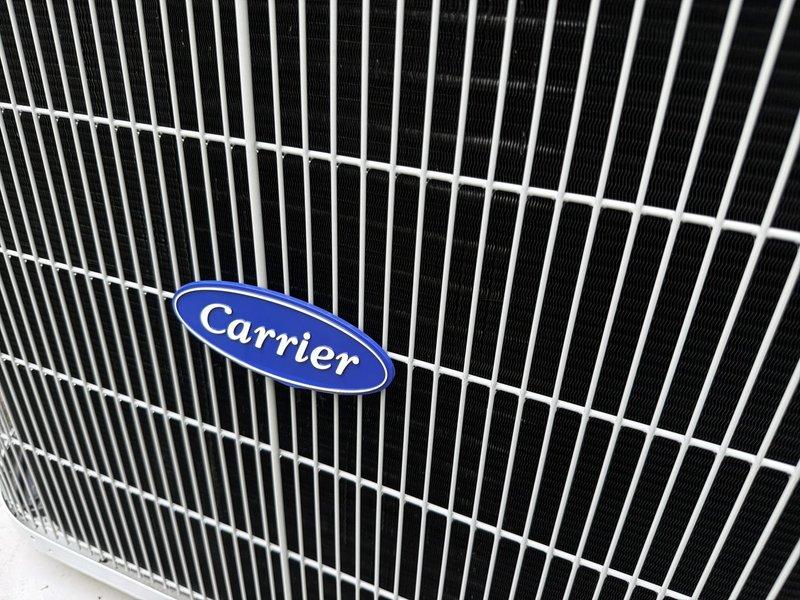 Completed semi-annual maintenance on two Carrier condensing units located on exterior concrete pads. Performed comprehensive inspection of both systems including condenser coil cleaning, refrigerant line examination, and electrical connection verification. Media filter replacement not included per service agreement specifications.