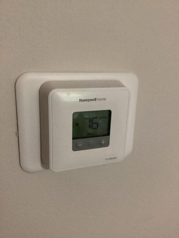 Completed preventive maintenance agreement service on two air conditioning systems. Performed comprehensive cooling checks including thermostat operation verification, electrical component inspection, and capacitor assessment. Documented existing capacitor showing signs of corrosion requiring future attention, while newer replacement capacitor in adjacent unit operating within normal parameters at proper voltage and microfarad ratings.