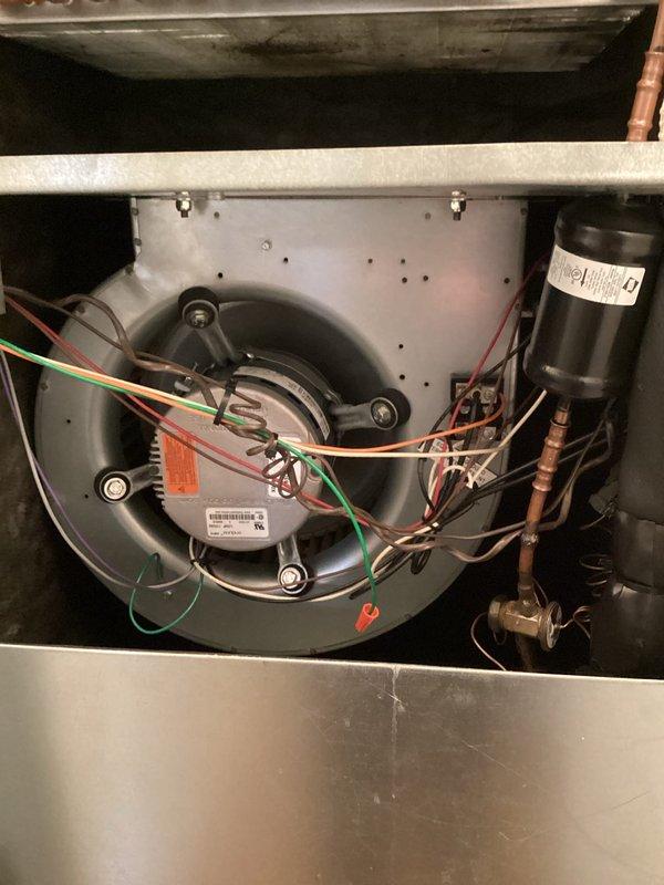 Completed routine maintenance inspection on condenser unit as part of HVAC maintenance agreement. Performed comprehensive visual inspection of blower motor assembly, electrical connections, capacitor, and refrigerant lines. All components found to be in proper working condition with secure wiring connections and normal operational wear. Unit operating within manufacturer specifications.