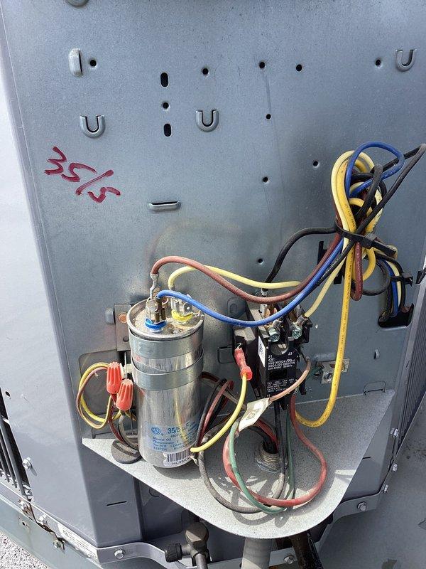 Completed routine maintenance inspection on condenser unit as part of HVAC maintenance agreement. Performed comprehensive visual inspection of blower motor assembly, electrical connections, capacitor, and refrigerant lines. All components found to be in proper working condition with secure wiring connections and normal operational wear. Unit operating within manufacturer specifications.