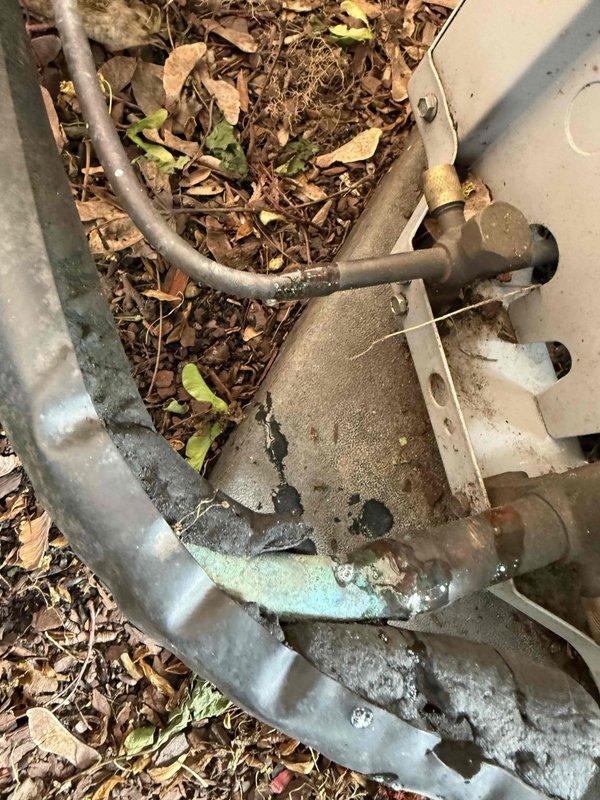 Responded to no cooling complaint on residential air conditioning system. Upon inspection, found system low on refrigerant charge. Installed filter drier on refrigerant line to remove moisture and contaminants from system. Evacuated and recharged system to manufacturer specifications. Verified proper cooling operation and system pressures before departure.