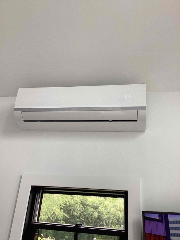 Responded to no cooling complaint on 1-year-old ductless mini-split system. Upon arrival, found wall-mounted indoor unit displaying temperature but not operating. Performed diagnostic testing and discovered system had tripped breaker due to electrical fault. Reset breaker, tested unit operation, confirmed proper cooling function restored, and verified all system parameters within normal operating range.