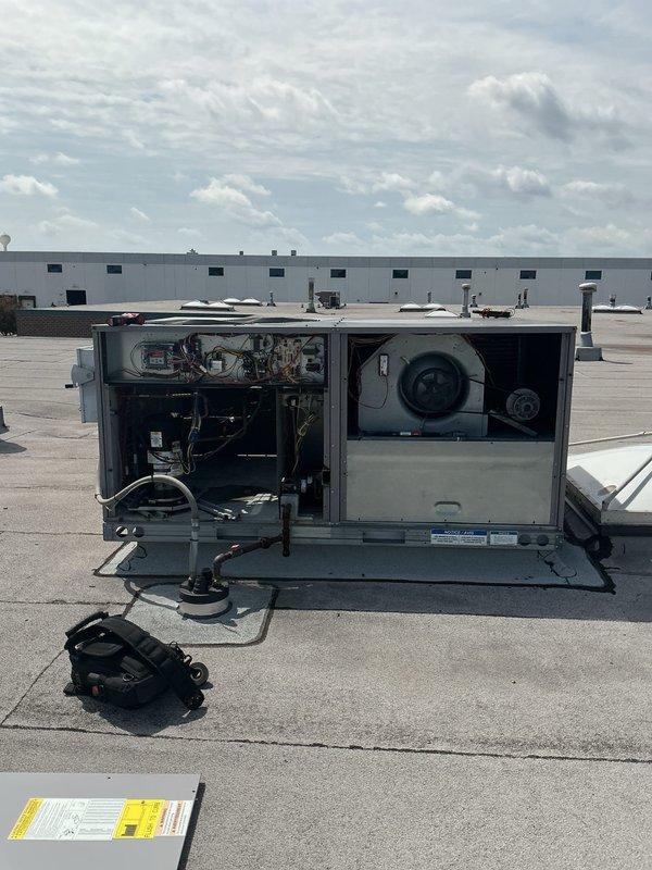 # HVAC Maintenance - Agreement Service Completed

Performed preventive maintenance on a commercial rooftop unit (RTU) requiring a 32-foot ladder for roof access. Accessed both electrical and blower compartments to conduct comprehensive inspection and servicing. Replaced two 16x25x2 filters to maintain proper airflow and system efficiency. Inspected electrical components including control board, capacitors, relays, and wiring harnesses, confirming all connections were secure and operational. Examined blower assembly and verified proper operation. All components found in good working condition with normal wear patterns for outdoor installation. System operational upon completion of maintenance agreement service.