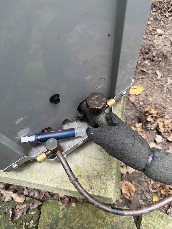 Returned to complete system recharge on residential HVAC unit. Connected manifold gauges to service ports and added refrigerant to bring system to proper operating charge per manufacturer specifications. System tested and verified operating within normal parameters upon completion.
