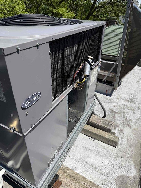 Returned to property to complete blower assembly cleaning on Carrier rooftop unit. Accessed unit through side panel, removed blower wheel and housing for thorough cleaning to remove accumulated debris and dust buildup. Cleaned blower motor and housing components, inspected electrical connections and capacitor for proper operation. Reassembled unit, verified blower operation and airflow. Unit tested and left in proper working condition.