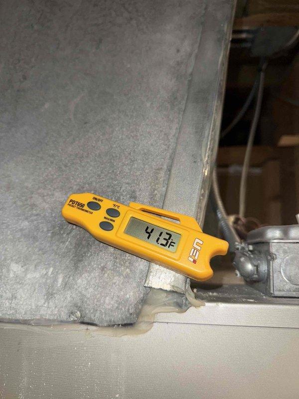 Responded to no cooling complaint on residential Carrier air conditioning system. Upon arrival, performed system diagnostics and temperature measurements. Recorded supply air temperature of 41.3°F at the ductwork, indicating proper cooling operation. Inspected outdoor condensing units and confirmed both Carrier systems were operational with no visible defects or mechanical issues. System found to be cooling adequately within normal operating parameters at time of service call.
