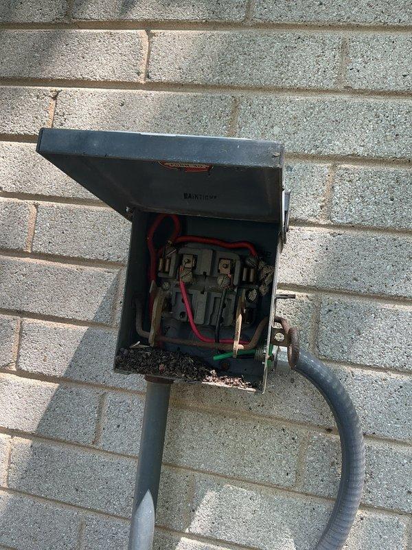 Completed preventative maintenance agreement inspection on two residential air conditioning systems. Performed comprehensive system evaluation including visual inspection of outdoor condenser units, electrical disconnect boxes, and associated components. 

During inspection, discovered significant accumulation of organic debris and plant material inside one electrical disconnect enclosure, which posed potential safety hazard and could compromise electrical connections. Cleaned out debris from disconnect box to ensure proper electrical operation and prevent moisture retention that could lead to component failure or electrical shorts. Verified all electrical connections were secure and functioning properly after cleaning.

Inspected both condenser units for proper operation, checking fan blade condition, housing integrity, and overall system performance. Noted weathering and age-related wear on equipment exteriors consistent with outdoor exposure. Verified units were properly positioned 