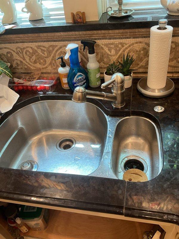 Responded to service call for leak under kitchen sink. Upon inspection, identified source of leak and completed necessary repairs to stop water intrusion beneath cabinet. Verified all connections were secure and tested system to confirm proper operation with no active leaks present. Left work area clean and functional.