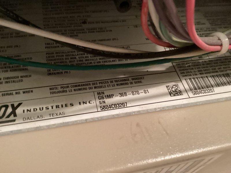 Completed HVAC maintenance agreement inspection on two air conditioning systems. During the inspection, identified and documented a safety concern with exposed wiring protruding from one of the condenser units. Photographed equipment data plates, internal components, and the wiring issue for service records and follow-up repair recommendations.