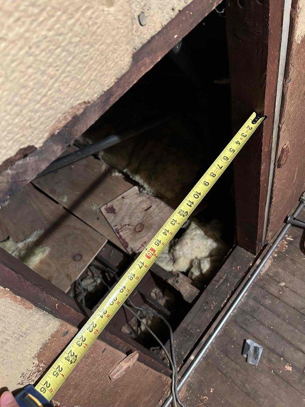 Technician responded to evaluate a 12-year-old R-410A air conditioning system located in the second-floor attic that was completely flat on refrigerant. System had a major leak and required refrigerant recharge the previous year, indicating ongoing refrigerant loss. Upon inspection, determined the unit was beyond economical repair due to age and severity of leak. Provided comprehensive repair options and replacement estimates to customer. Also identified that the first-floor air conditioning unit was low on refrigerant and requires attention. Documented equipment condition and access points with photos. Recommended full system replacement for the second-floor unit as the most cost-effective long-term solution.